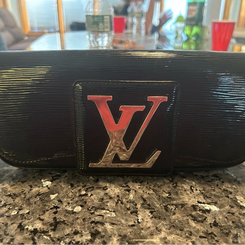 Louis Vuitton Black and Silver Logo Clutch